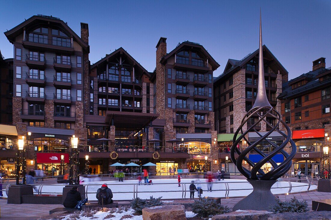 USA, Colorado, Vail, Vail Village Ice Rink at The Lionshead Complex, dusk