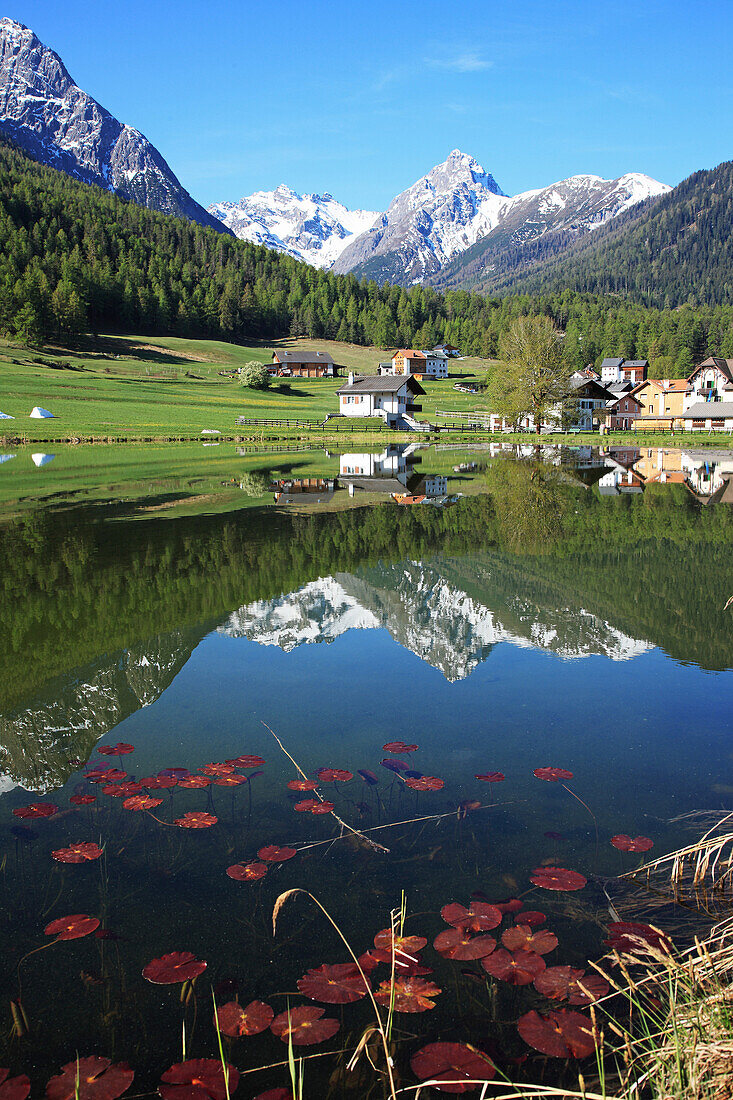 Travel, Geography, Europe, Switzerland, Graubunden, Grisons, Engadin, Lower Engadine, Tarasp, Alps, Mountain, Lake, Reflection, Tranquil, Idyllic, Landscape, Scenic, Day, No People, nobody, Vertical. Travel, Geography, Europe, Switzerland, Graubunden, Gri