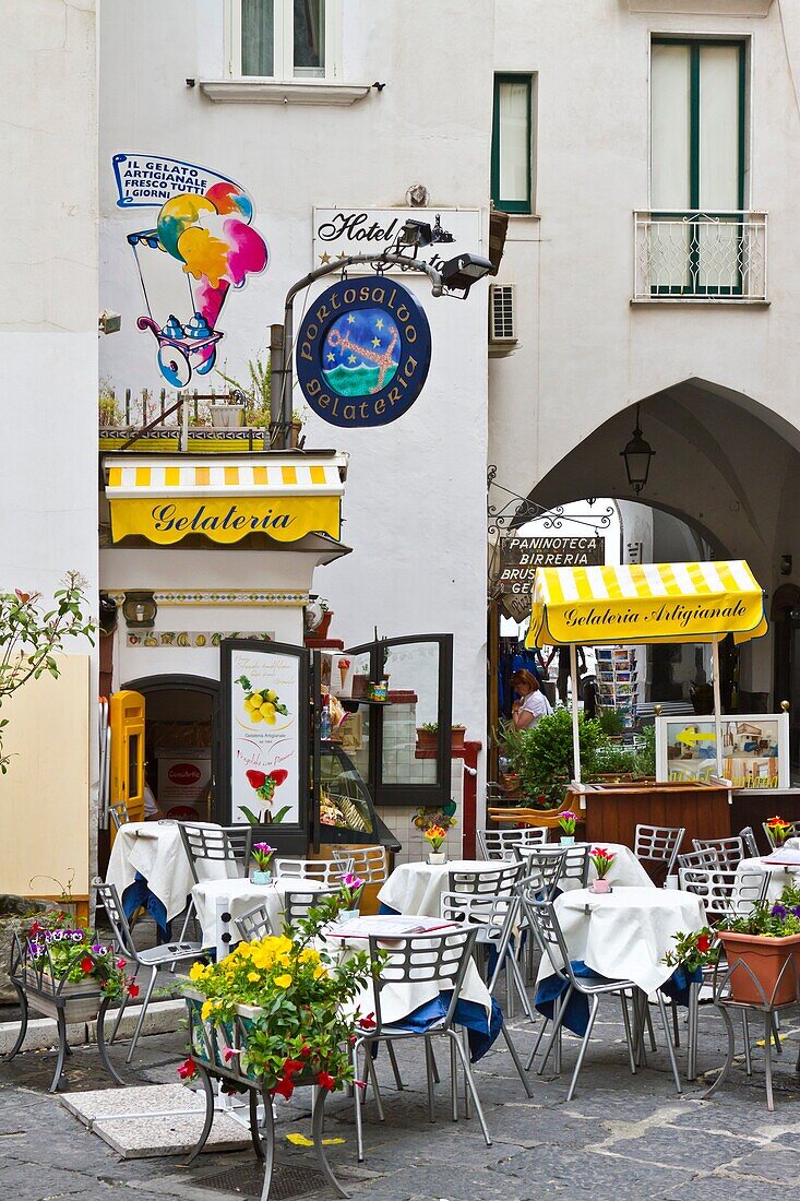 An outdoor restaurant in the town of Amalfi on the Gulf of Salerno in southern Italy