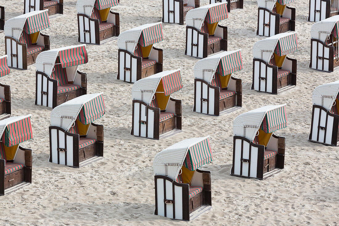 Beach chairs in a row on the beach, Sellin, Ruegen, Mecklenburg-West Pomerania, Germany