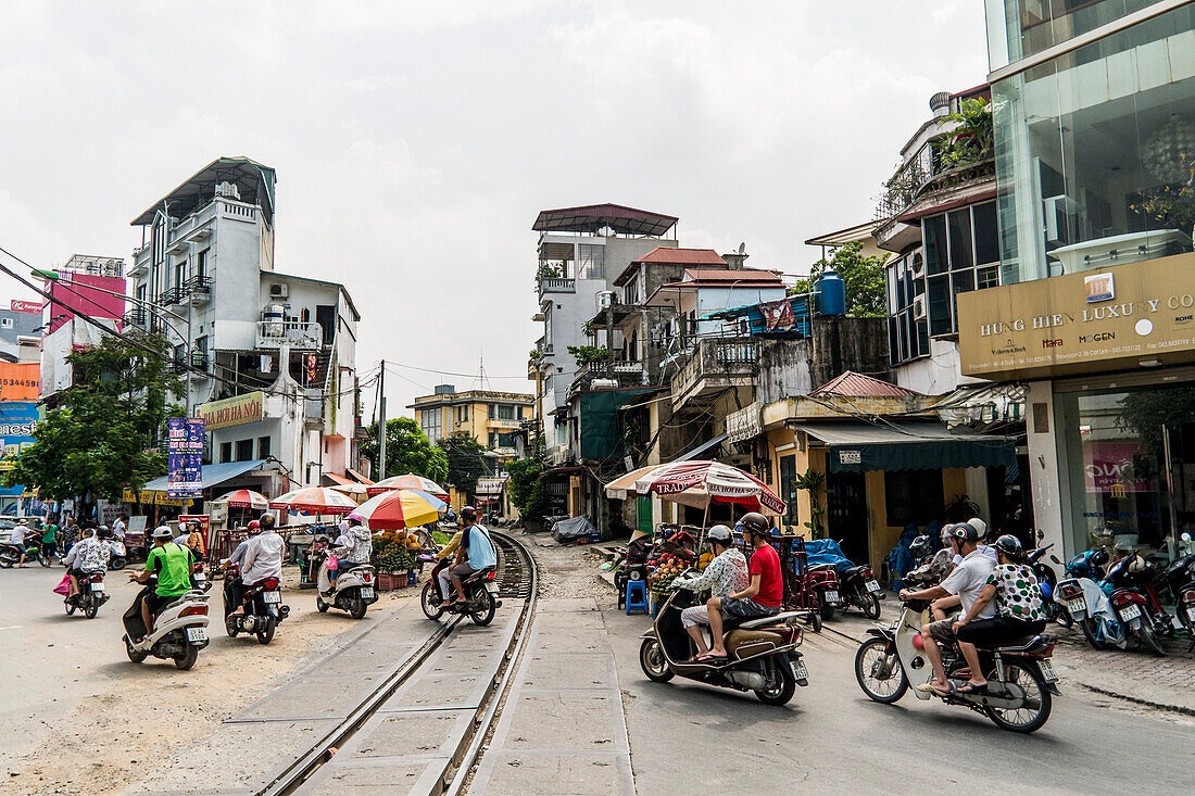 Street scene with mopeds, Hanoi, Vietnam, Asia