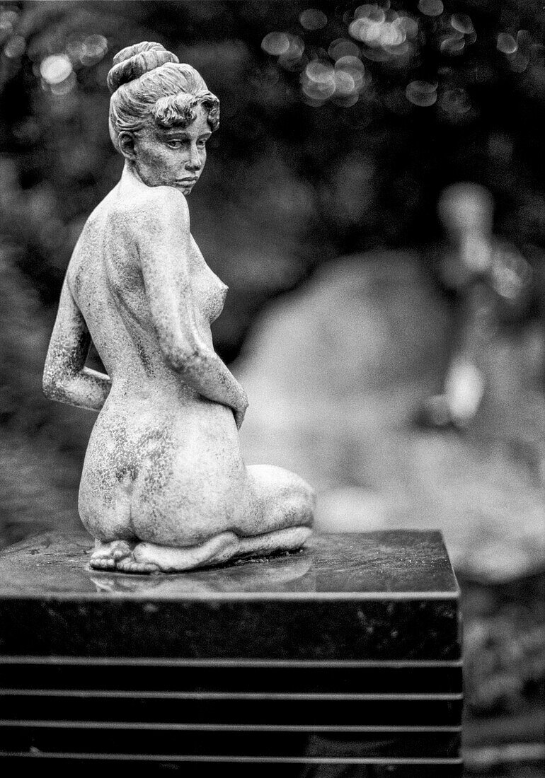 Sculpture of Female Looking Over Her Shoulder