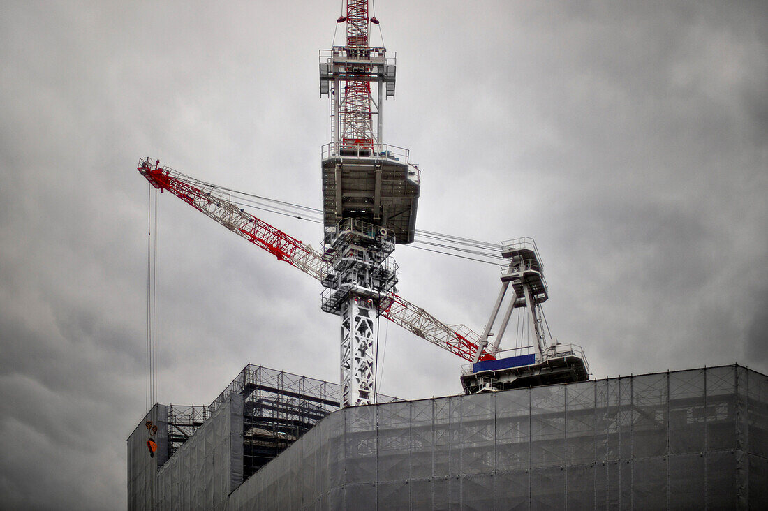 A large construction crane in the Omotesando District in Tokyo. Construction inthe city.