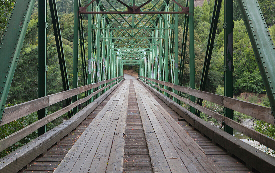 One Lane Bridge is an old iron bridge over the Mattole river, in California.