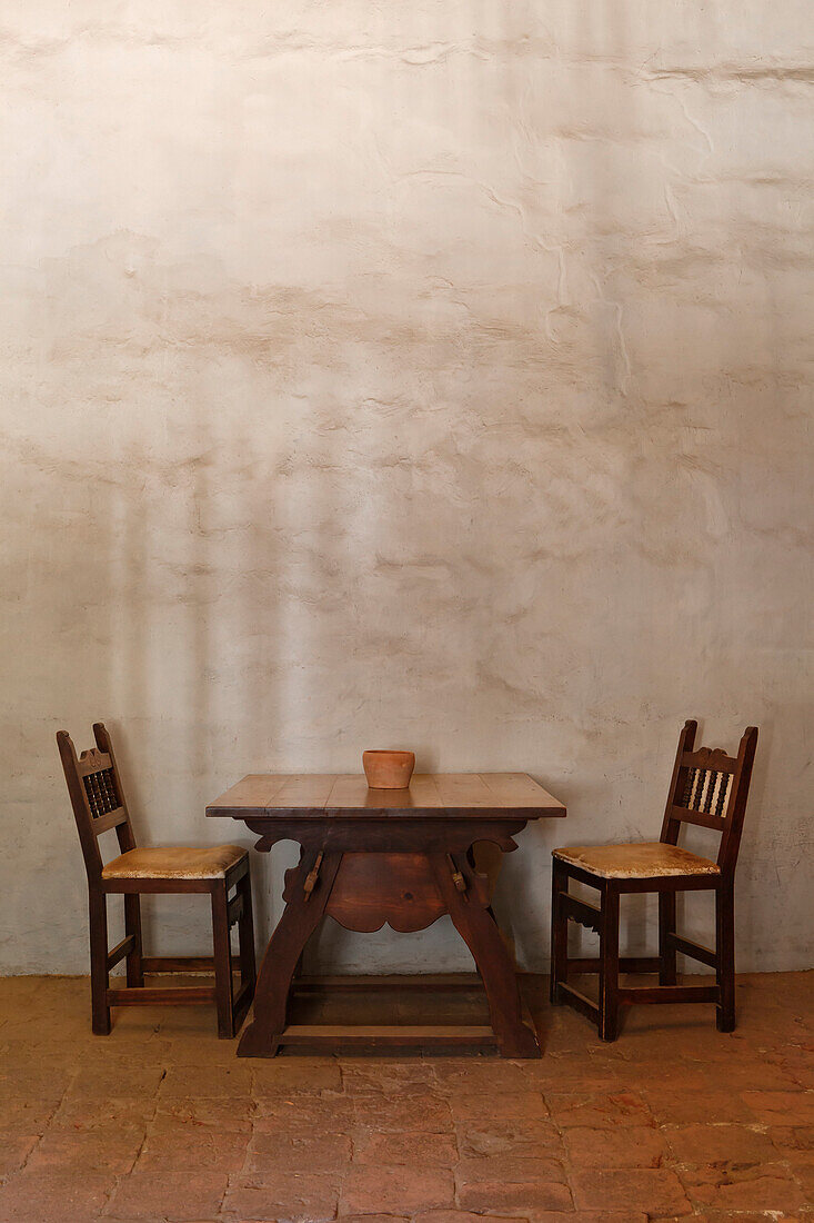Table and chairs in adobe building at Mission La Purisima State Historic Park, Lompoc, California, Founded in 1787, the eleventh mission of the twenty-one Spanish Missions established in California
