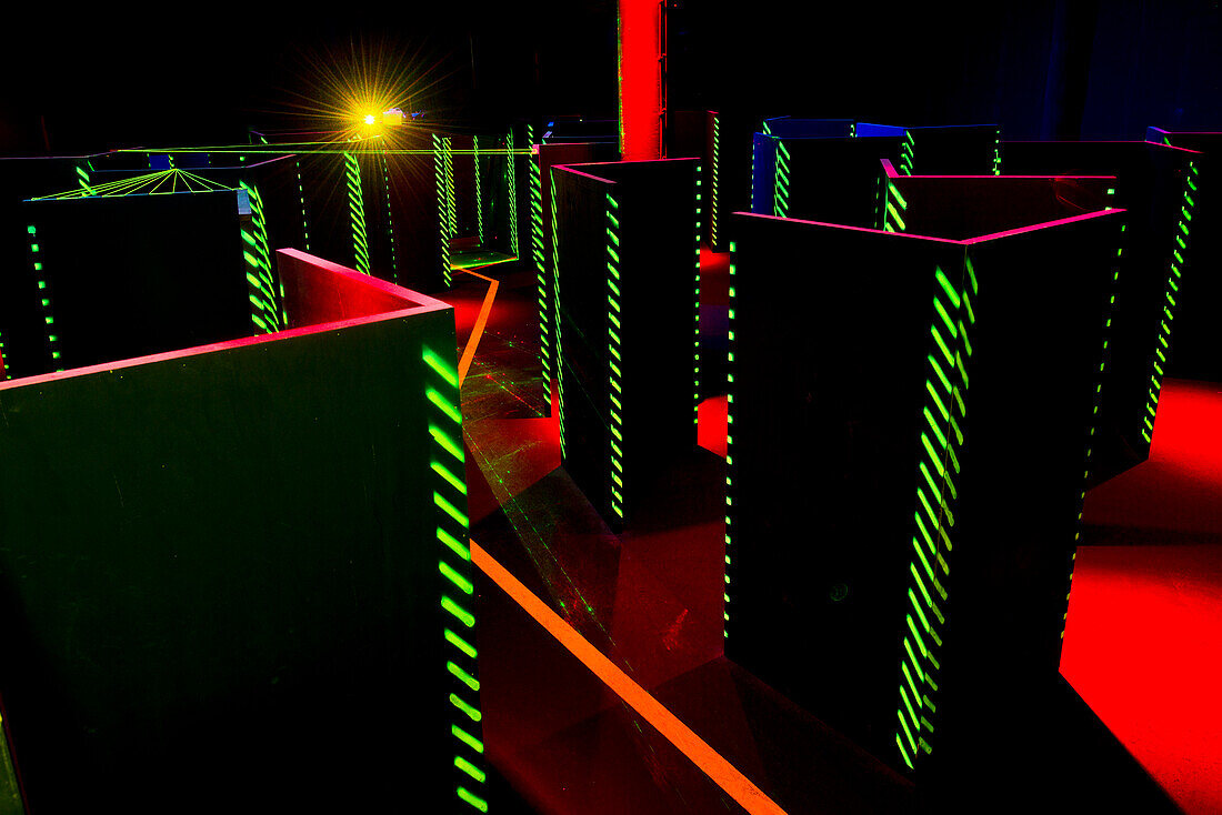 Laser game area with obstacles and hide-outs, with lasers and low lighting, Walls and narrow alleys