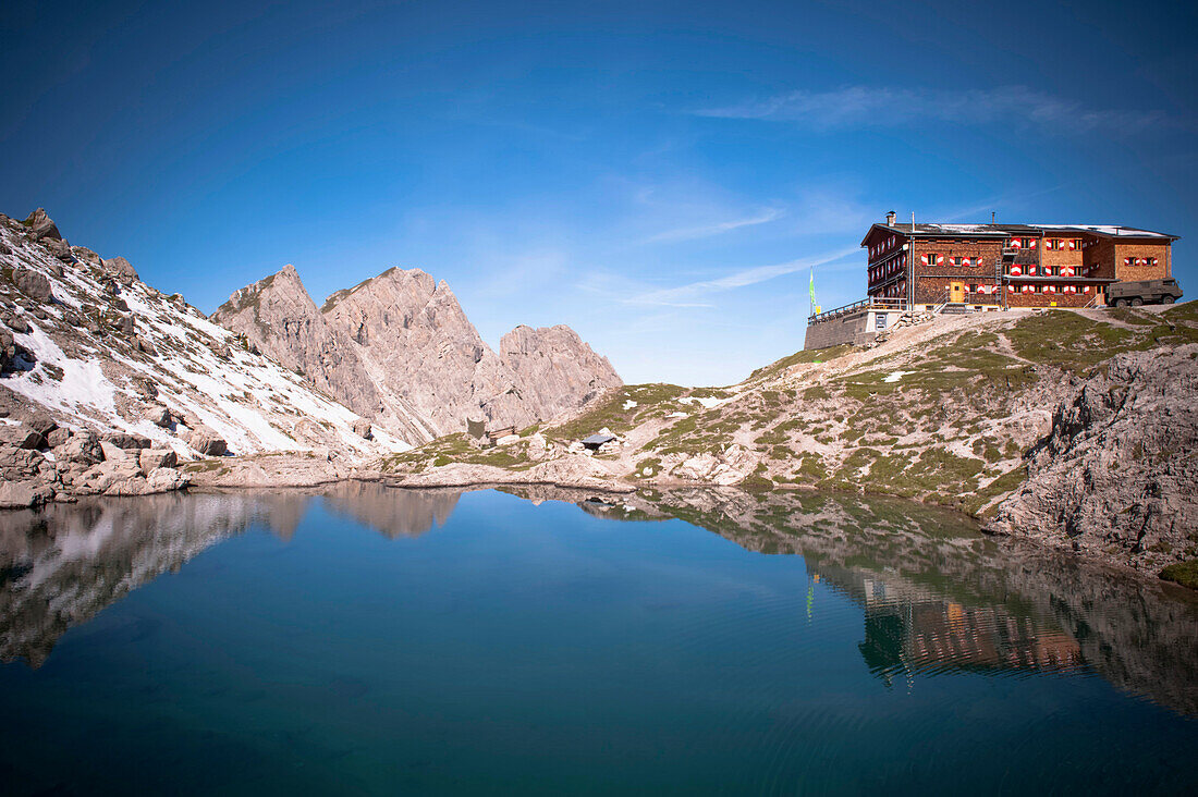 hut with mountain lake in the Lienz Dolomites, East Tyrol, Tyrol, Austria
