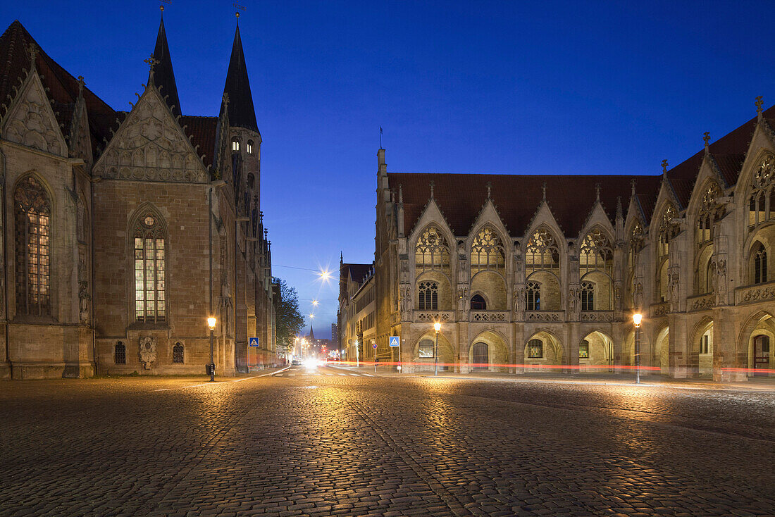 Historic old market square at night in gothic style with St. Martini church and old town hall, blue hour, Brunswick, Lower Saxony, Germany