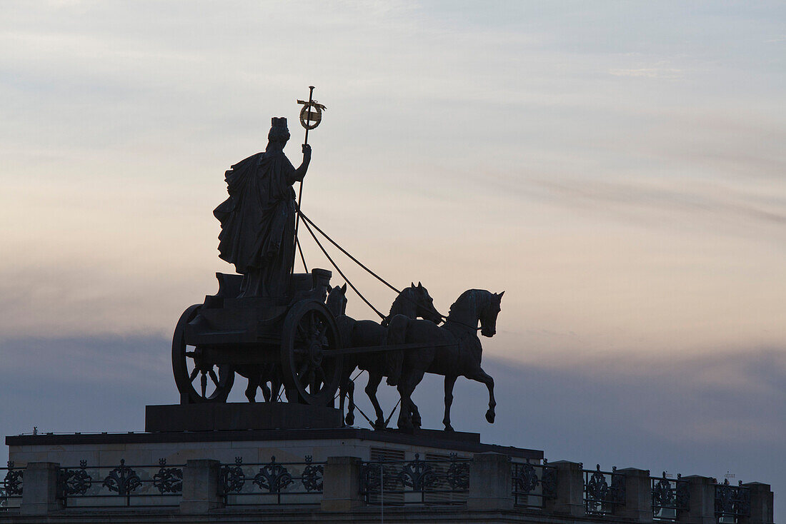 Quadriga on Brunswick Palace in the evening light, reconstruction of the historic facade after damage during world war II and subsequent demolition, the adjoining shopping centre, Schlossarkaden, contains over 150 shops and restaurants, classicism, Brunsw