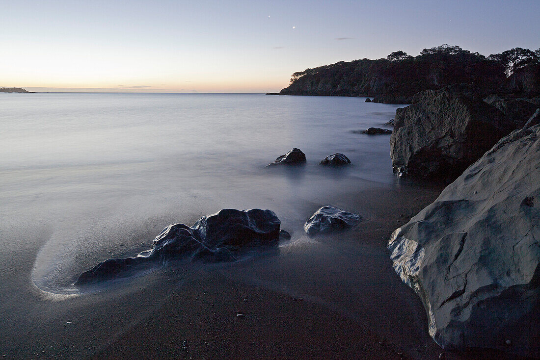 blocked for illustrated books in Germany, Austria, Switzerland: Rocky coastline at dusk, Whanarua Bay, East Cape, North Island, New Zealand