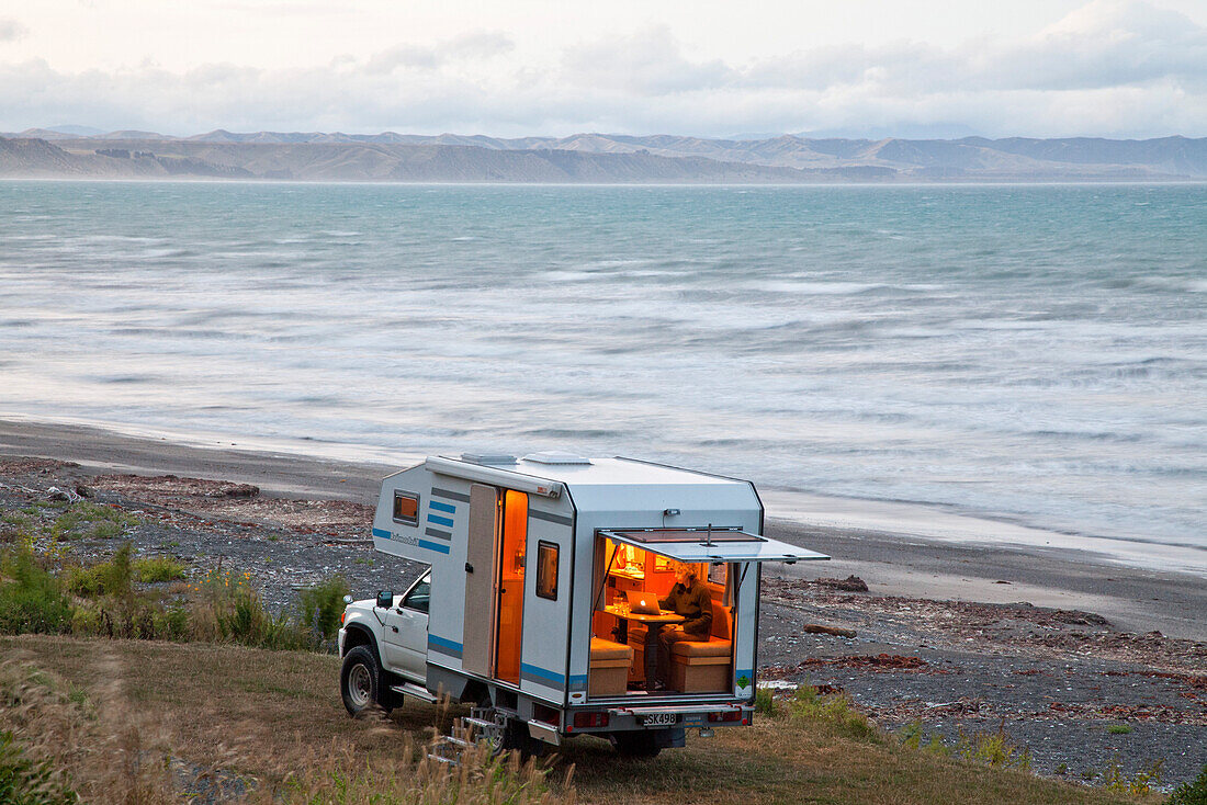 blocked for illustrated books in Germany, Austria, Switzerland: 4WD camper van on the coast, Camping by the sea, South Island, New Zealand