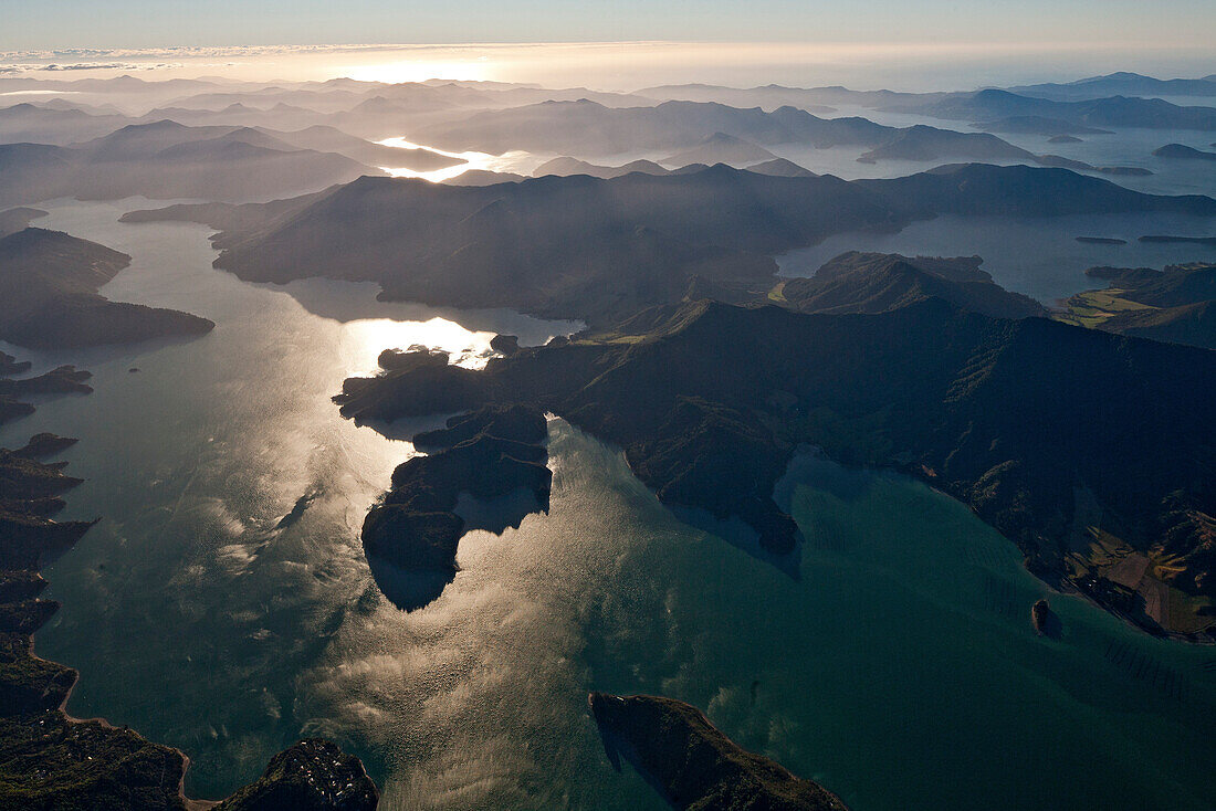 blocked for illustrated books in Germany, Austria, Switzerland: Aerial view of bays and islands in Marlborough Sounds with back light, Marlborough Sounds, South Island, New Zealand