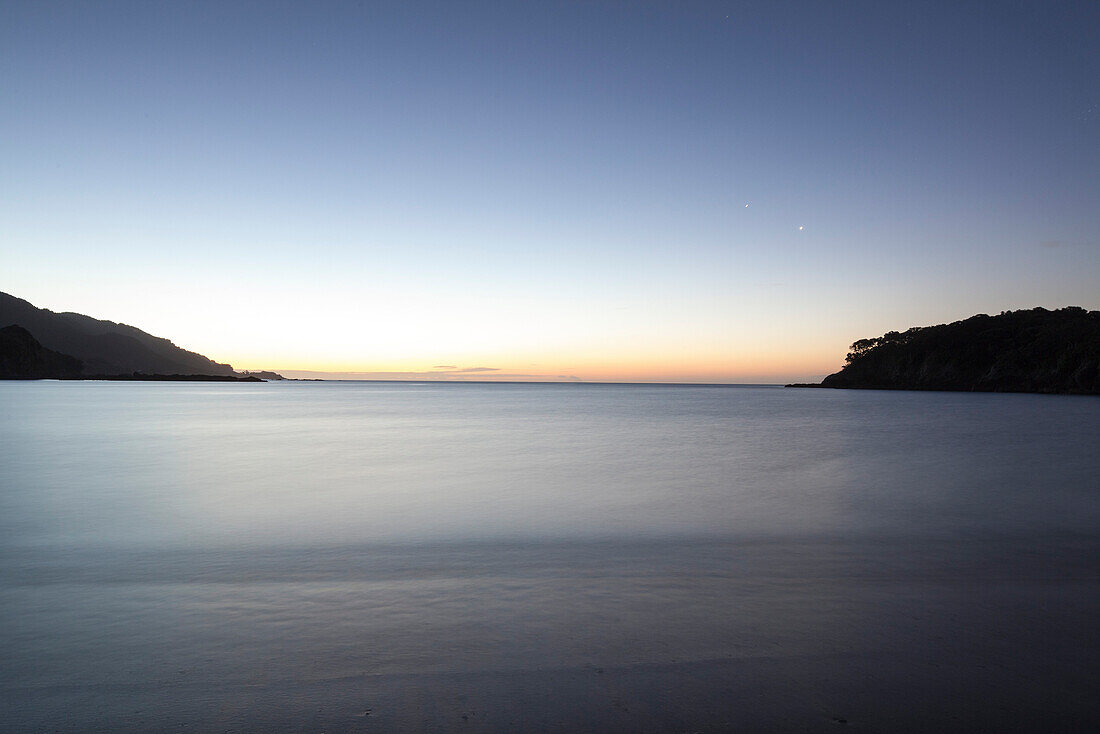 Secluded bay at dusk, East coast at Whanarua Bay, East Cape, North Island, New Zealand