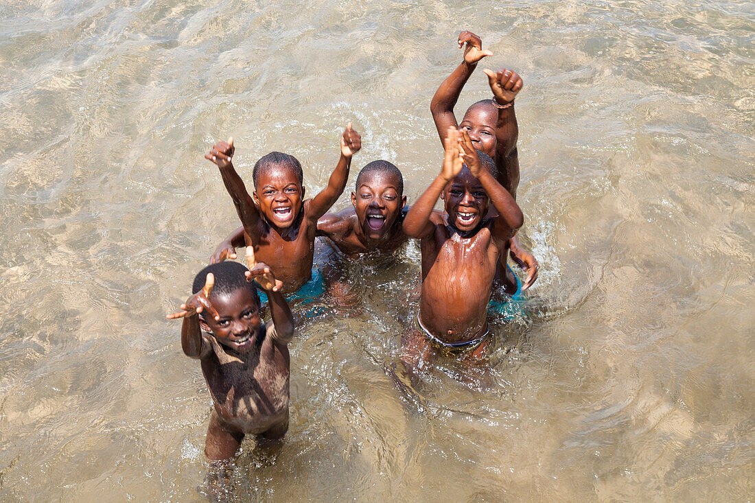 African children bathing, Kalilani village at lake Tanganyika, Mahale Mountains National Park, Tanzania, East Africa, Africa