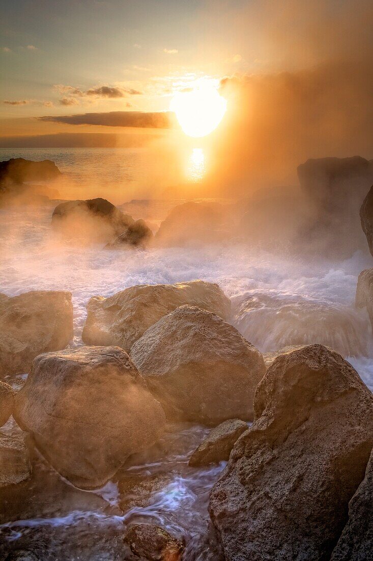 Sunset with Geothermal steam and rocky coast  Reykjanes Peninsula, Iceland