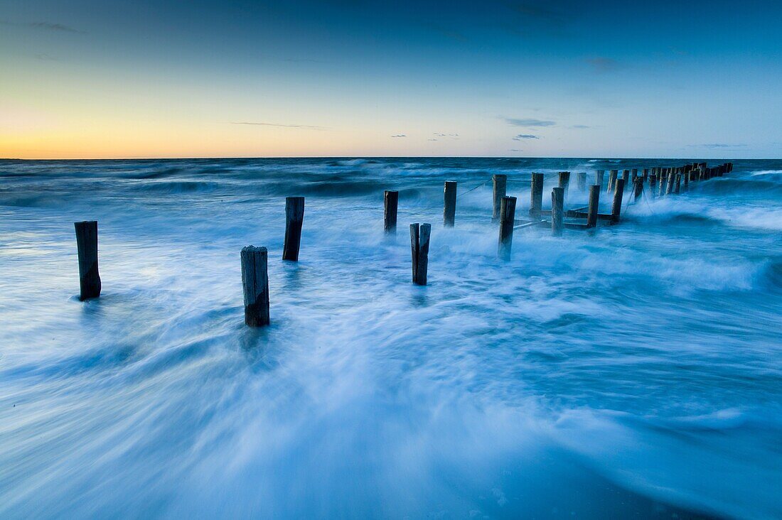 Decayed wooden jetty, Beach of Zingst, Baltic Sea, Germany