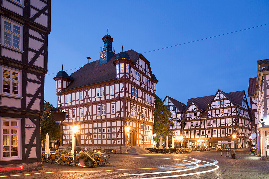 Town hall framed by other timbered houses. The town hall was reconstructed in 1556 after a fire destroyed the former building, Melsungen, Hesse, Germany, Europe
