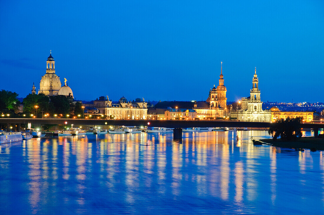 View over the river Elbe towards the barock historic city of Dresden at night, Bruehls Terrace and Frauenkirche, Dresden, Saxony, Germany