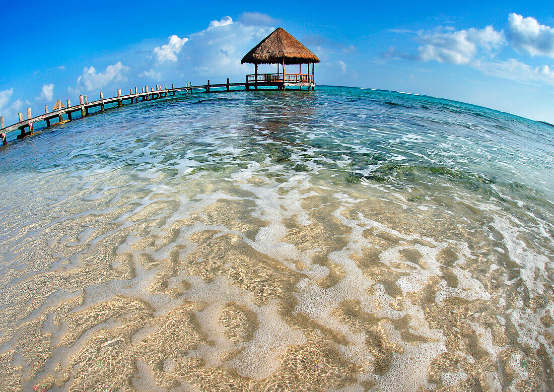 Mexico, Yucatan Peninsula, Tulum, Pier over turquoise ocean.