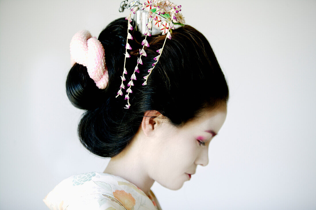 Portrait of traditional Japanese Maiko profile.