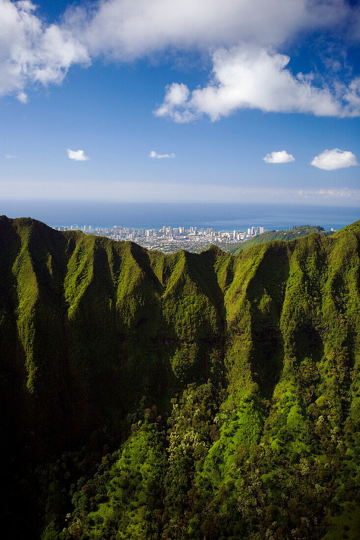 Hawaii, Oahu, Aerial of Honolulu overlooking the Koolau Mountains.