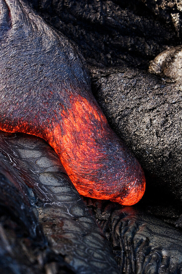 Hawaii, Big Island, Hawaii Volcanoes National Park, Kilauea Volcano, Detail of flowing molten pahoehoe lava.