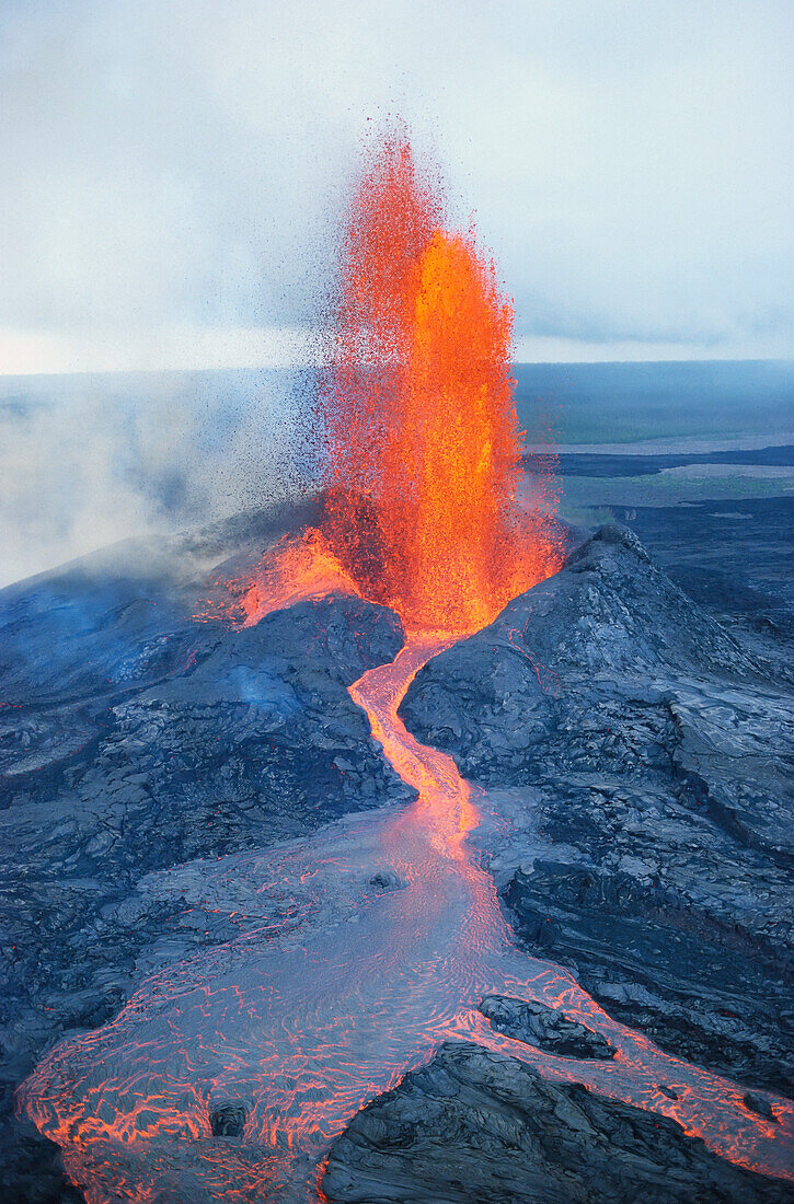 Hawaii, Big Island, Hawaii Volcanoes National Park, fountaining lava, Pu'u O'o vent with river, smoke A26H
