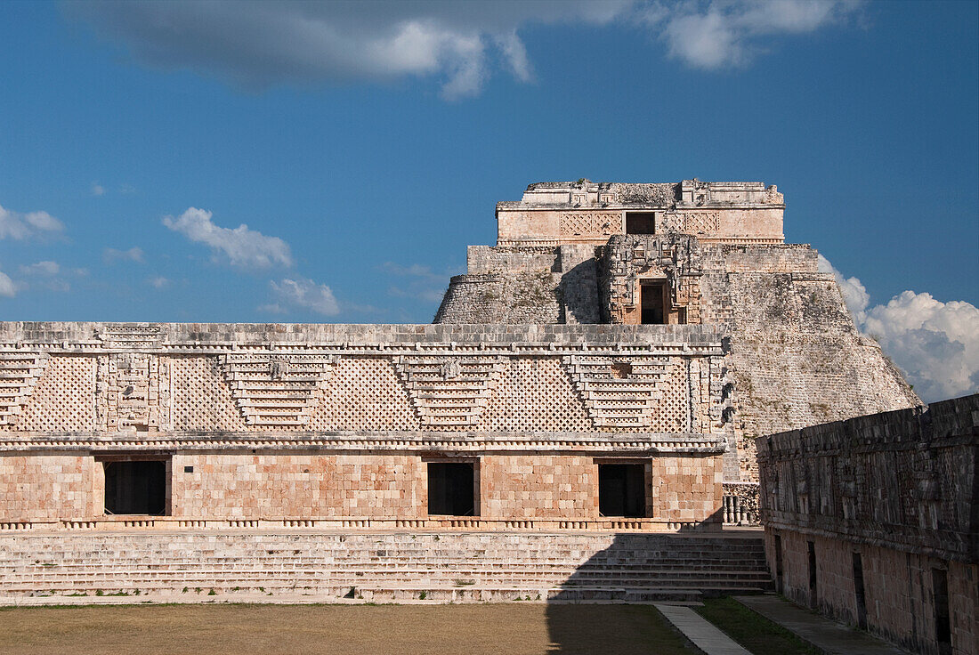 Mexico, Yucatan, Uxmal, Cuarangulo de las Monjas (Nuns Quadrangle), eastern side (foreground), Casa del Advino (Magician's House) in background
