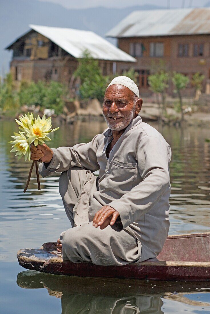 Man On Boat Holding Flowers