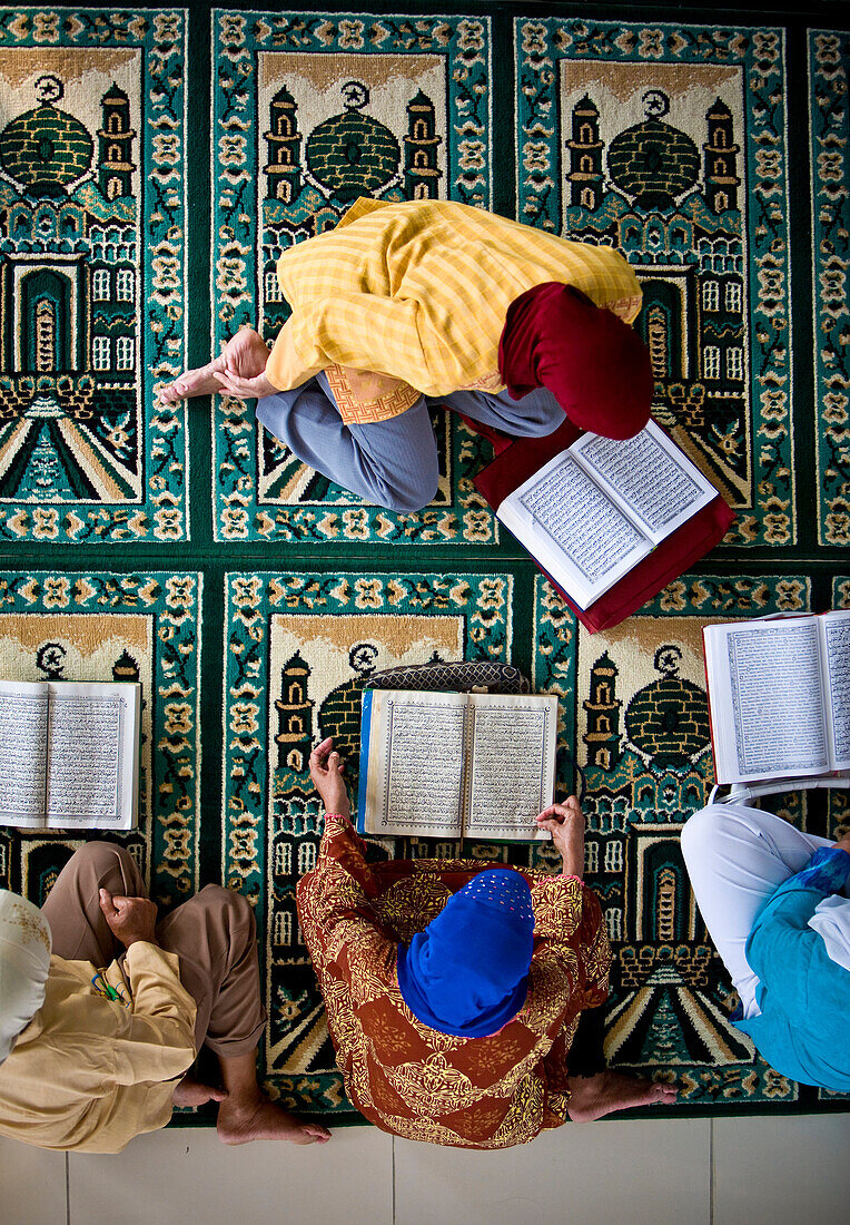 'Four People Reading The Koran; Indonesia'