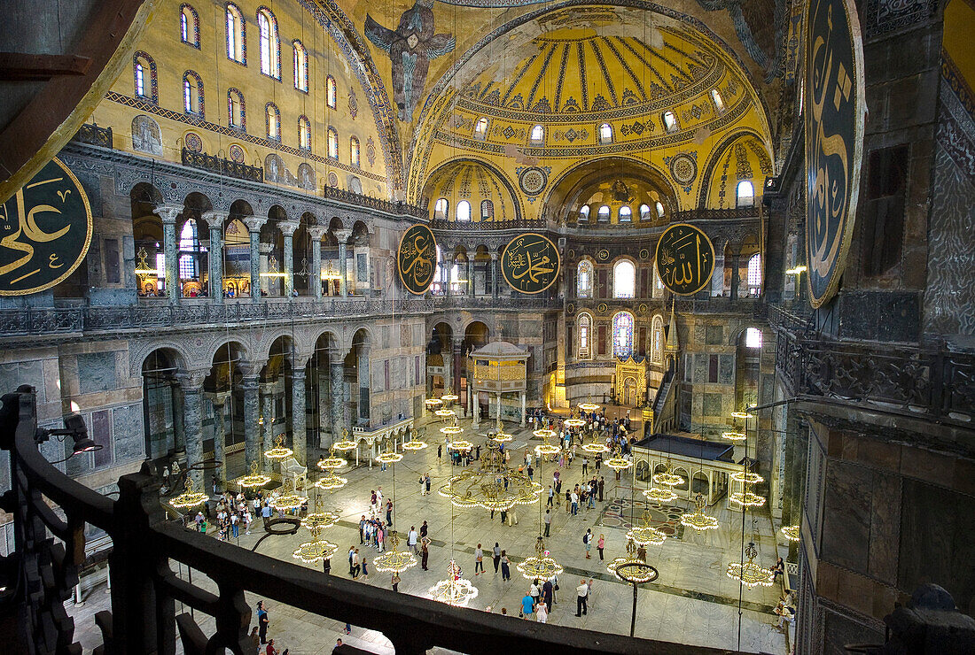 Turkey, Istanbul, Sultanahmet. Interior of Haghia Sophia with domed ceiling and decorative mosaic tiled walls