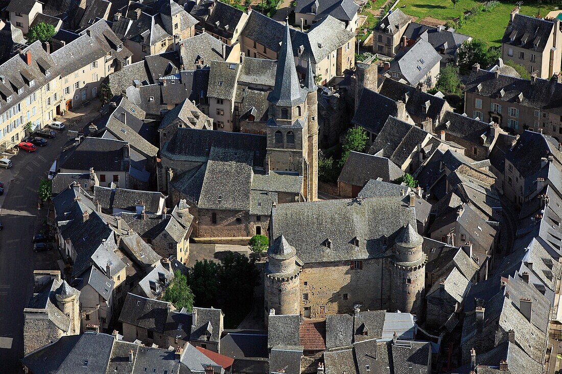 France, Aveyron (12), Saint-Come-Olt, village labeled one of The Most Beautiful Villages of France, located on the path of pilgrimage of Saint Jacques de Compostella, church steeple with a twisted, (aerial photo)