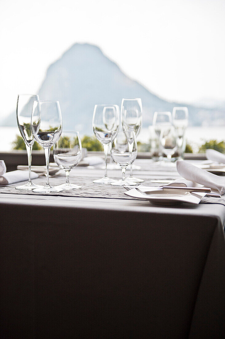 Set table in the restaurant of Hotel Castagnola, Lake Lugano, Lugano, Ticino, Switzerland