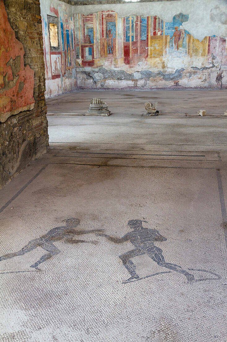 Mosaic of two athletes in the entrance corridor at house VII.2.23, historic town of Pompeii in the Gulf of Naples, Campania, Italy, Europe