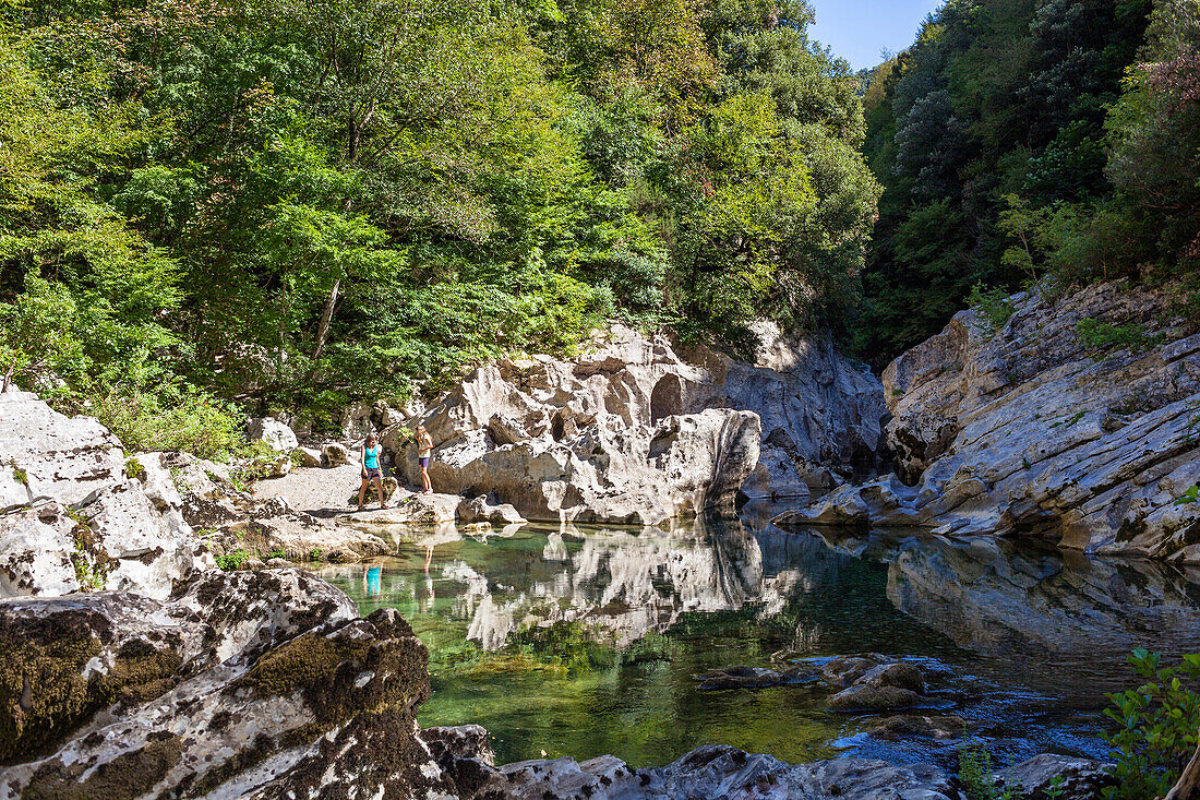 Mother and daughter at the river, Calore Gorge, Cilento National Park, Cilento, Campania, Southern Italy, Europe