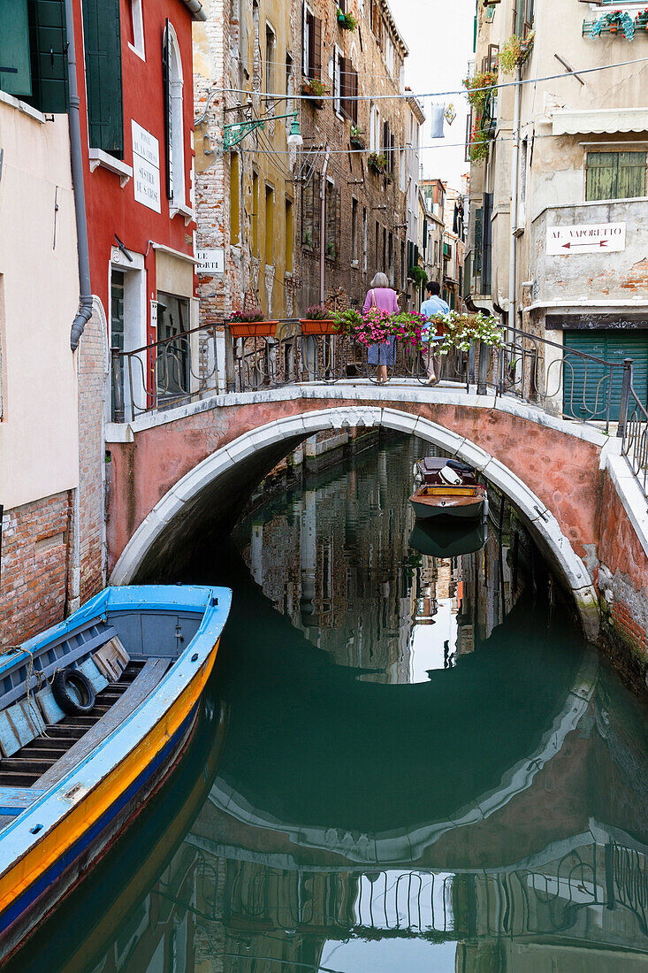 Canal bridge and boats, Venice, Venetia, Italy, Europe