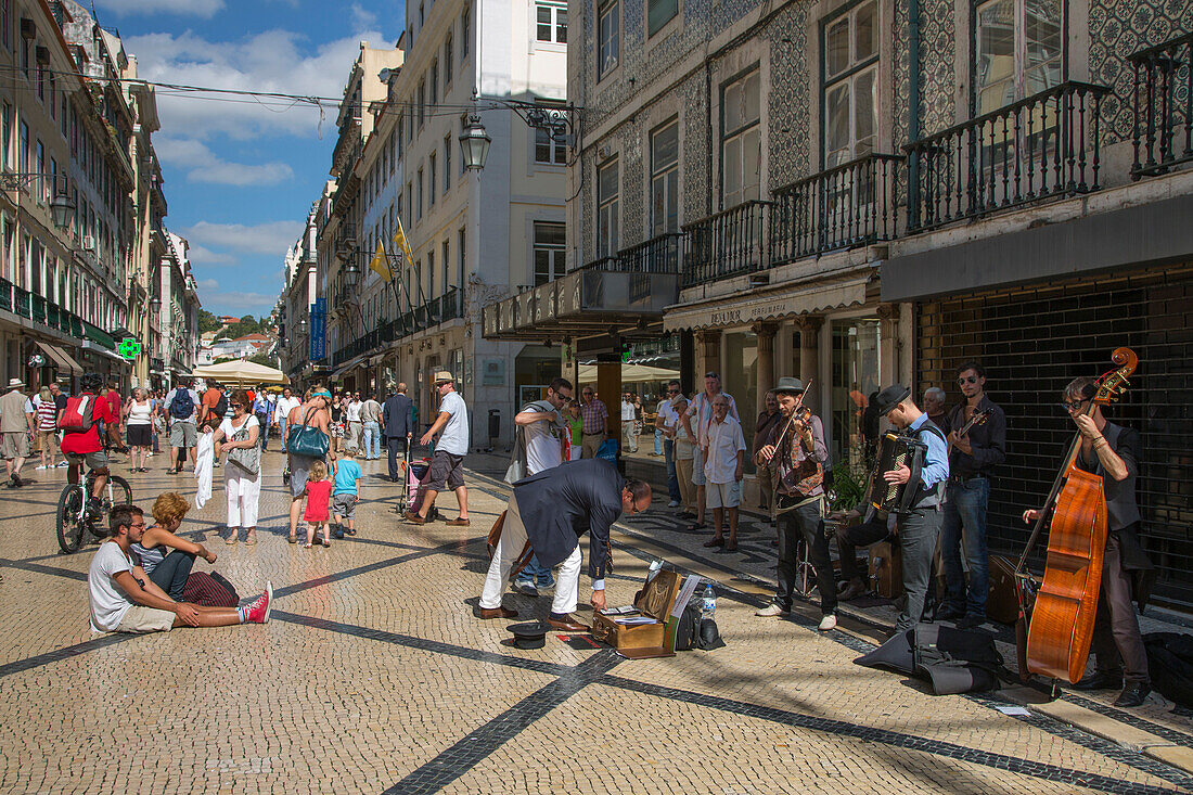 Street musicians performing on Rua Augusta pedestrian street in Baixa district, Lisbon, Lisboa, Portugal