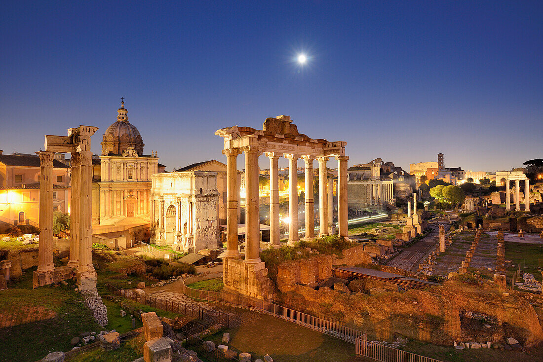 Illuminated Roman Forum at night with temple of saturn in the middle, UNESCO World Heritage Site Rome, Rome, Latium, Lazio, Italy