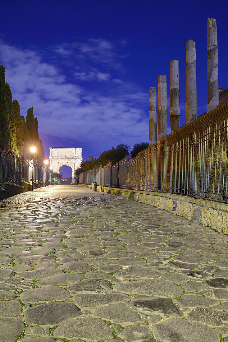 Via sacra leading towards the Arch of Titus, illuminated, Roman Forum, UNESCO World Heritage Site Rome, Rome, Latium, Lazio, Italy