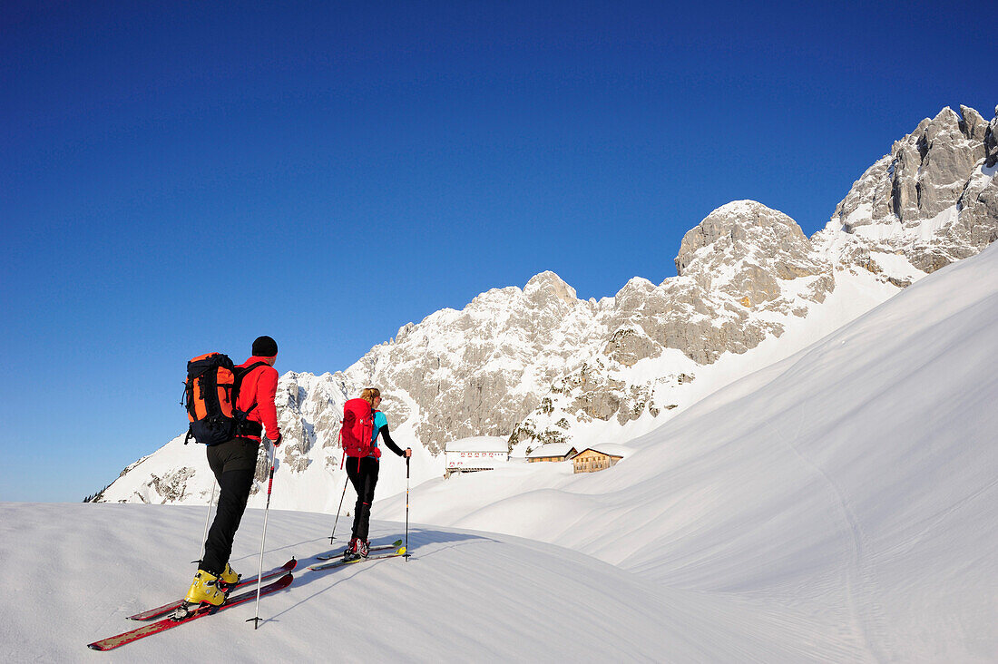Two backcountry skiers ascending to hut Gruttenhuette, Kaiser-Express, Rote-Rinn-Scharte, Wilder Kaiser, Kaiser mountain range, Tyrol, Austria