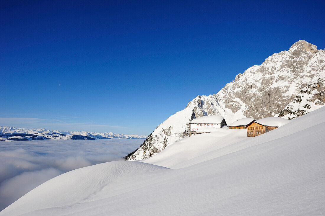 Hut Gruttenhuette in snow, Wilder Kaiser, Kaiser mountain range, Tyrol, Austria