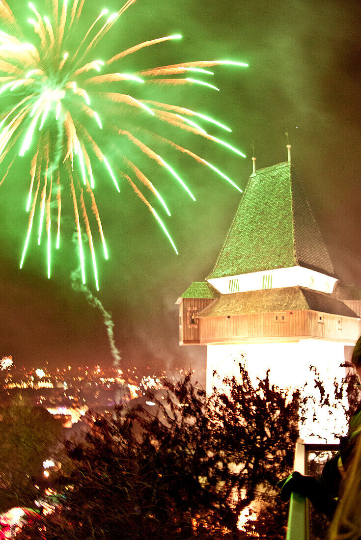 New Years Eve fireworks over the Schlossberg, Graz, Styria, Austria