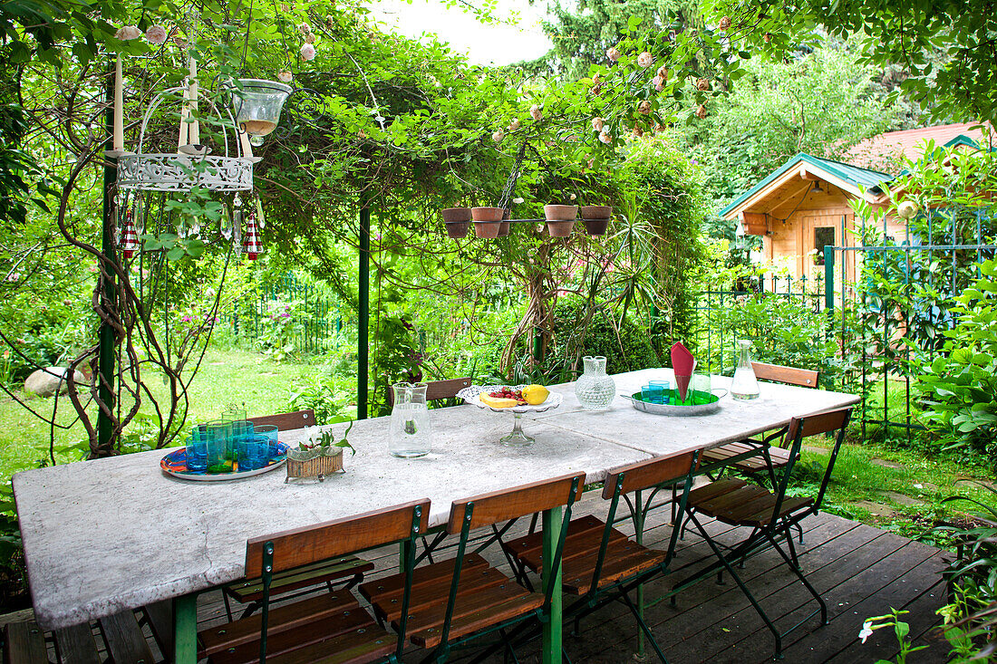 Laid table at the terrasse of the garden, Vienna, Austria