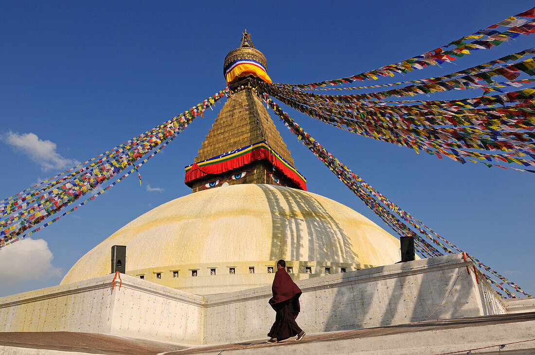 Buddhist monk at Bodnath Stupa, Kathmandu, Kathmandu Valley, Nepal, Asia