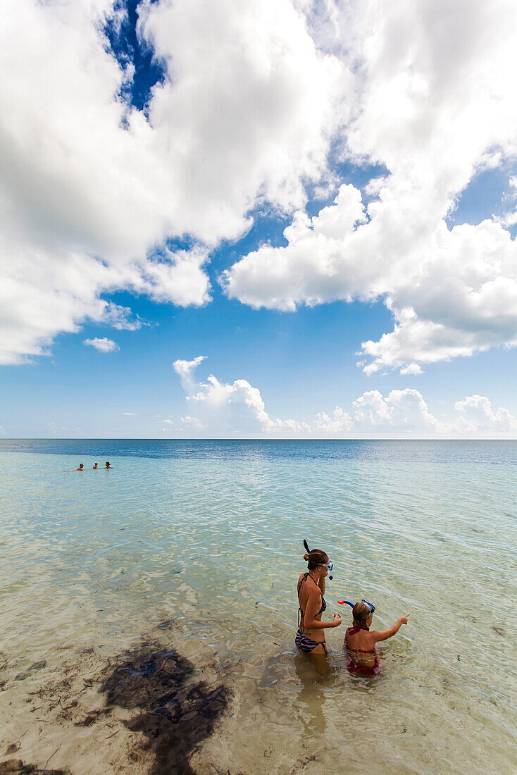 Two young girls snorkelling, beach at Bahia Honda State Park, Florida Keys, USA