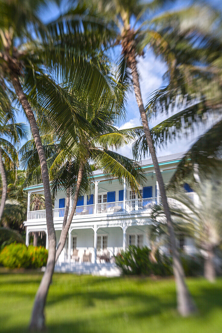 Moorings Village Resort with wooden villa BLUE CHARLOTTE in the background, Islamorada, Florida Keys, Florida, USA