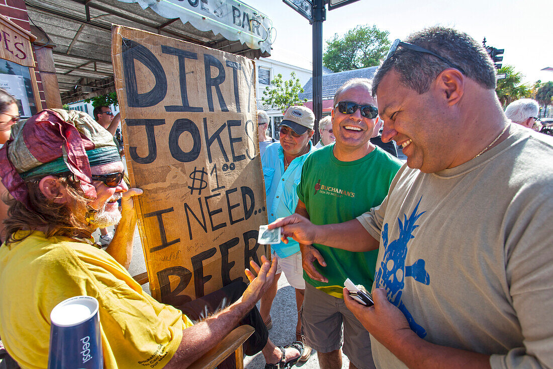 Standup Comedian telling jokes for money, Duval Street, Key West, Florida Keys, Florida, USA