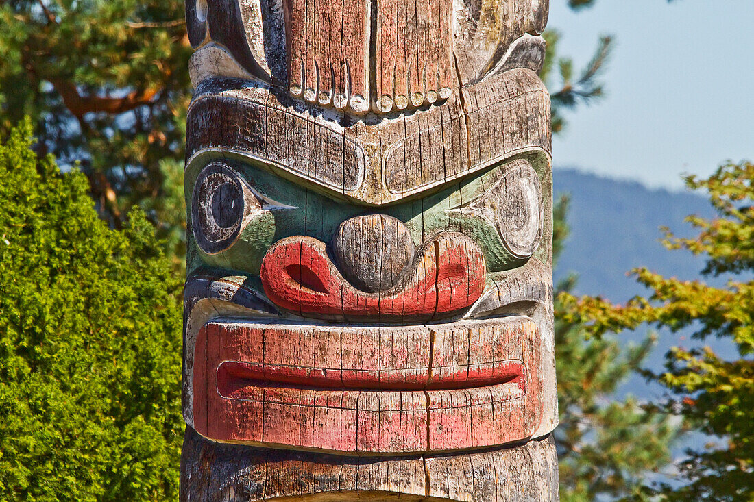Kwakiutl Totem pole, carved by Mungo Martin with Henry Hunt & David Martin by the Maritime Museum, Vancouver, British Columbia, Canada