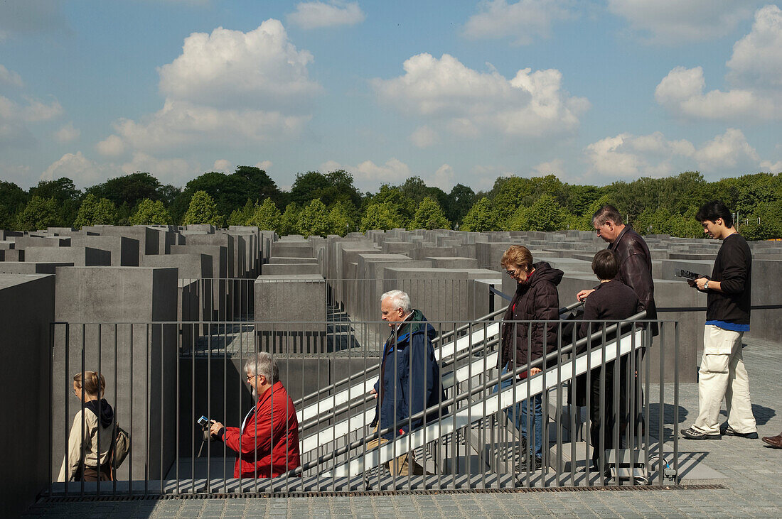 People at the entrance to the underground Information Centre at the Memorial to the Murdered Jews of Europe, Berlin, Germany