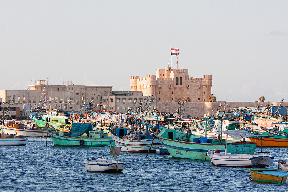 Fishing boats in the Eastern Harbour and Fort Qaitbey, Alexandria, Al IskandarÄ«yah, Egypt